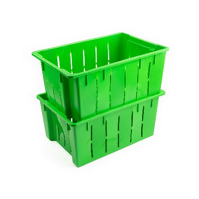 A stack of green plastic crates on top of each other.