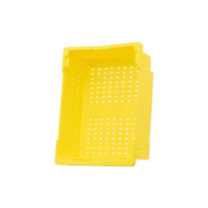 A yellow plastic container with holes for the bottom.