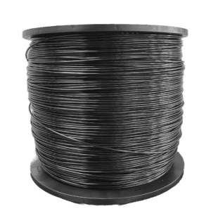 A spool of black wire on top of a green background.
