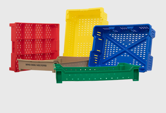 A group of plastic crates sitting next to each other.